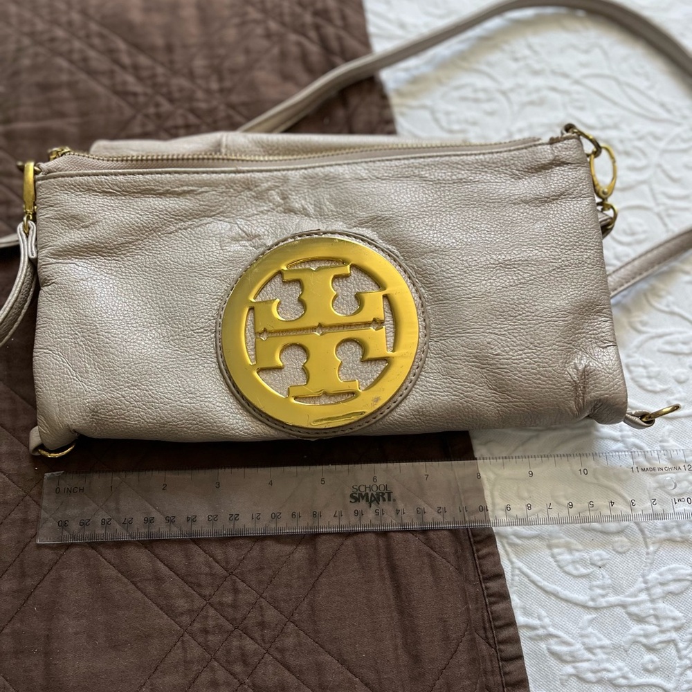 Tory Burch gold/cream purse with short and long straps.